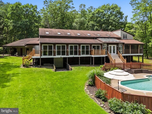 13013 Alum Springs Rd, Culpeper, VA 22701 - back of house with stairs, french doors, a wooden deck, a sunroom, and an outdoor pool