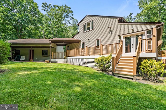 13013 Alum Springs Rd, Culpeper, VA 22701 - back of property with a wooden deck and a lawn