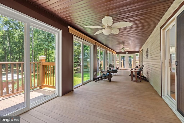 13013 Alum Springs Rd, Culpeper, VA 22701 - sunroom featuring french doors, a ceiling fan, wood ceiling, hardwood / wood-style floors, and a deck