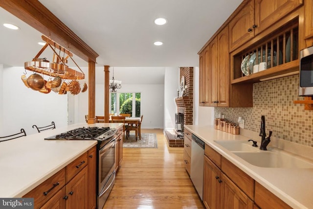 13013 Alum Springs Rd, Culpeper, VA 22701 - kitchen with stainless steel appliances, light wood finished floors, decorative backsplash, light countertops, and recessed lighting