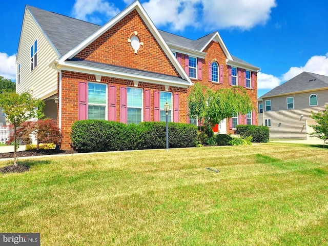 9423 Reservoir Rd, Fredericksburg, VA 22407 - colonial home featuring brick siding and a front yard