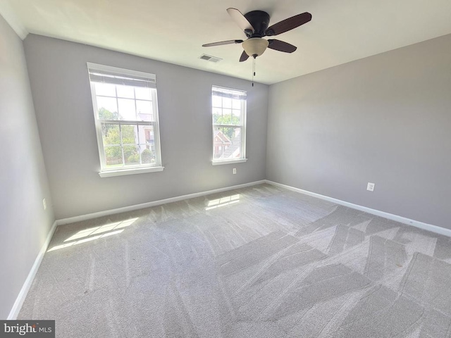 9423 Reservoir Rd, Fredericksburg, VA 22407 - unfurnished room featuring carpet, baseboards, and a ceiling fan