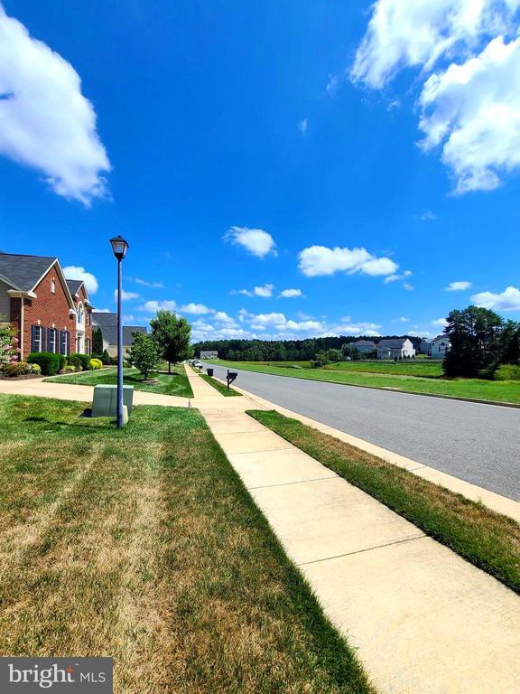 9423 Reservoir Rd, Fredericksburg, VA 22407 - view of asphalt road featuring street lighting and sidewalks