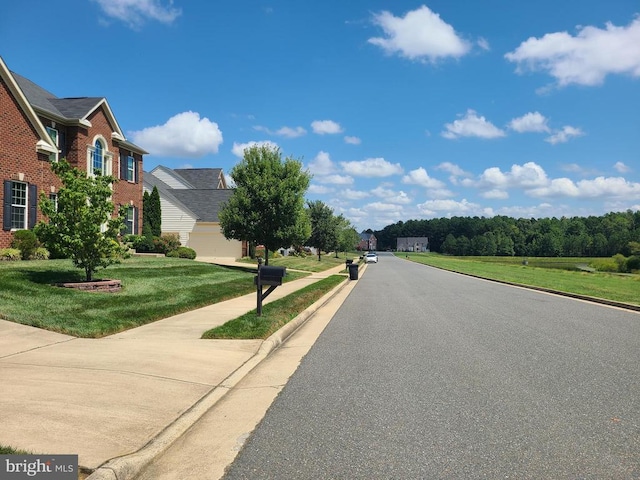 9423 Reservoir Rd, Fredericksburg, VA 22407 - view of asphalt road featuring sidewalks and curbs