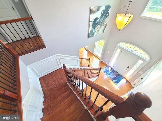 9423 Reservoir Rd, Fredericksburg, VA 22407 - stairway featuring a towering ceiling and wood finished floors
