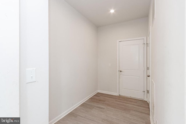 9003 Walnut Hill Rd, Fredericksburg, VA 22408 - corridor featuring light wood-style flooring and baseboards