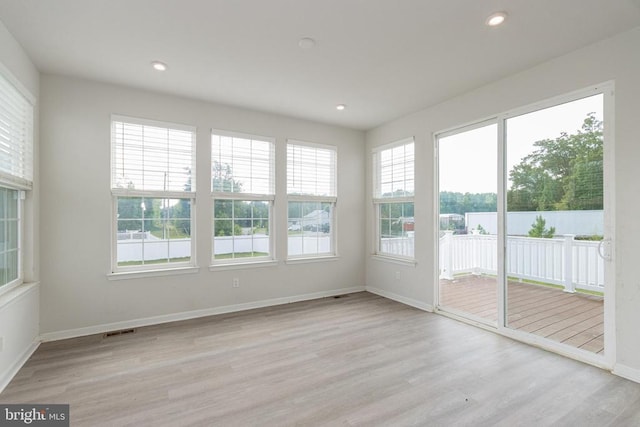 9003 Walnut Hill Rd, Fredericksburg, VA 22408 - unfurnished sunroom with wood finished floors and recessed lighting