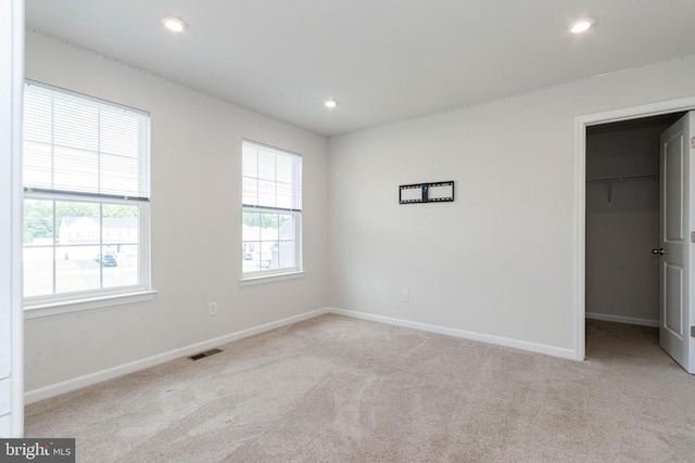 9003 Walnut Hill Rd, Fredericksburg, VA 22408 - unfurnished bedroom featuring carpet flooring, a spacious closet, and recessed lighting