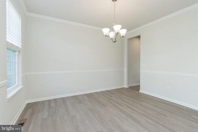 9003 Walnut Hill Rd, Fredericksburg, VA 22408 - empty room with a chandelier, wood finished floors, and crown molding