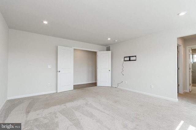 9003 Walnut Hill Rd, Fredericksburg, VA 22408 - unfurnished bedroom with light carpet and recessed lighting