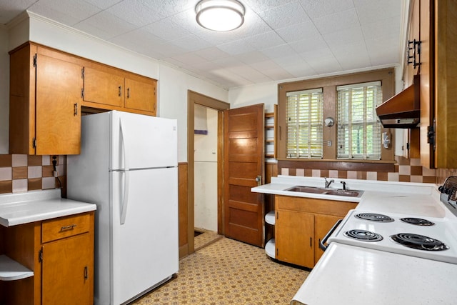 917 Chestnut Dr, Harrisonburg, VA 22801 - kitchen featuring white appliances, a sink, custom range hood, brown cabinetry, and light countertops