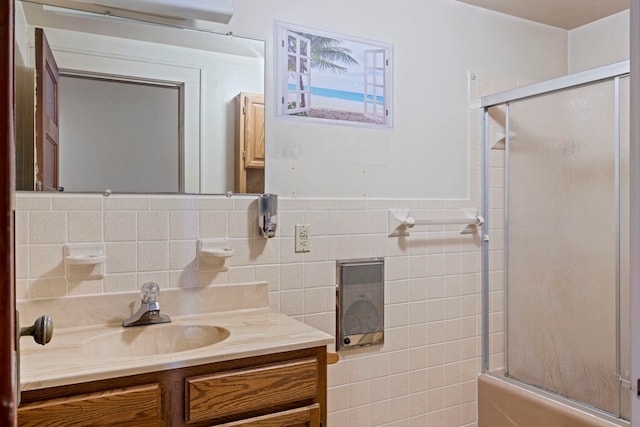 917 Chestnut Dr, Harrisonburg, VA 22801 - bathroom with an enclosed shower, vanity, tile walls, and a wall unit AC
