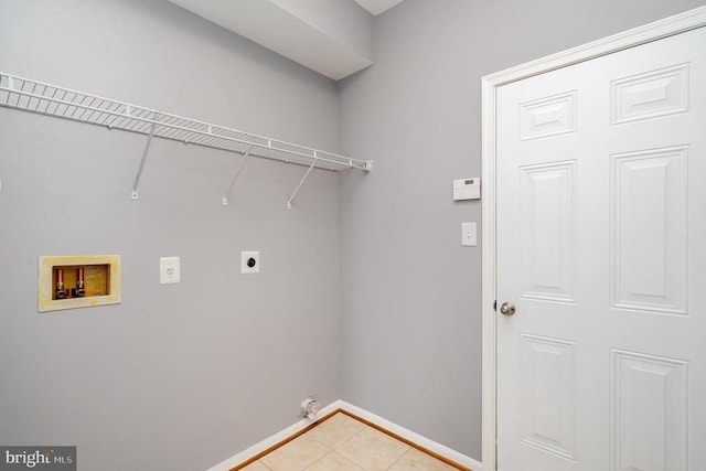 6304 Dranesville Dr W, Fredericksburg, VA 22407 - laundry area with hookup for an electric dryer, hookup for a washing machine, and light tile patterned floors