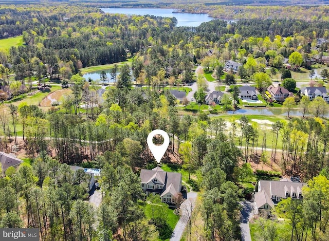 11304 Chivalry Chase Ln, Spotsylvania, VA 22551 - aerial perspective of suburban area featuring a large body of water and a forest