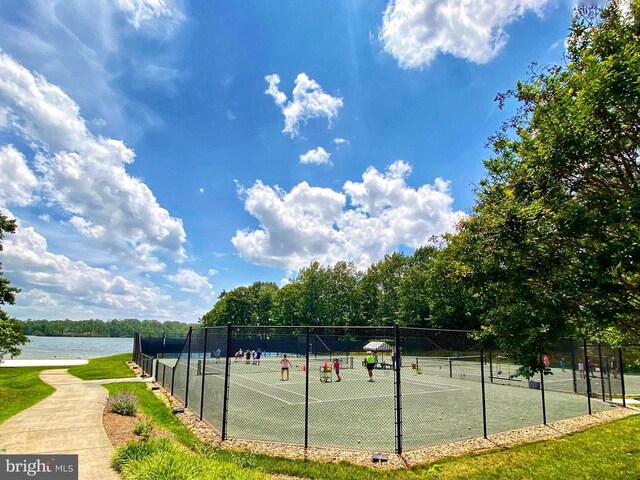 11304 Chivalry Chase Ln, Spotsylvania, VA 22551 - view of tennis court featuring a water view