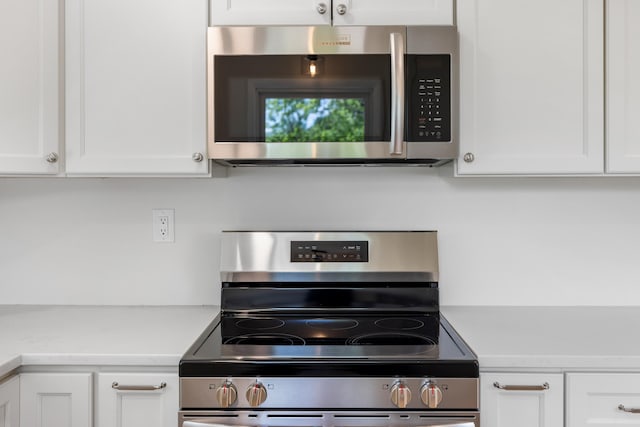 96 Featherstone Dr, Lyndhurst, VA 22952 - kitchen with appliances with stainless steel finishes, white cabinets, and light countertops
