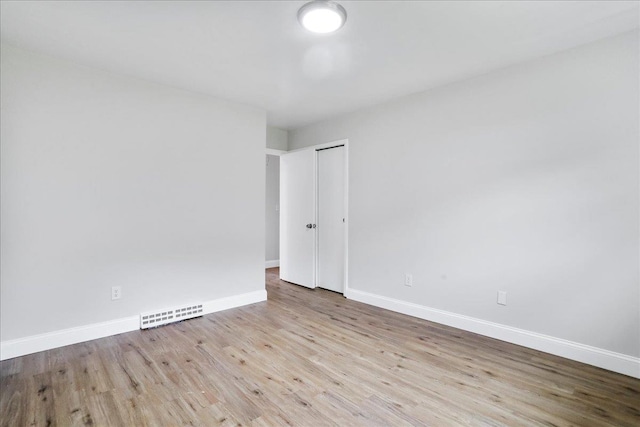210 Jackson Ave, New Market, VA 22844 - spare room featuring wood finished floors and baseboards