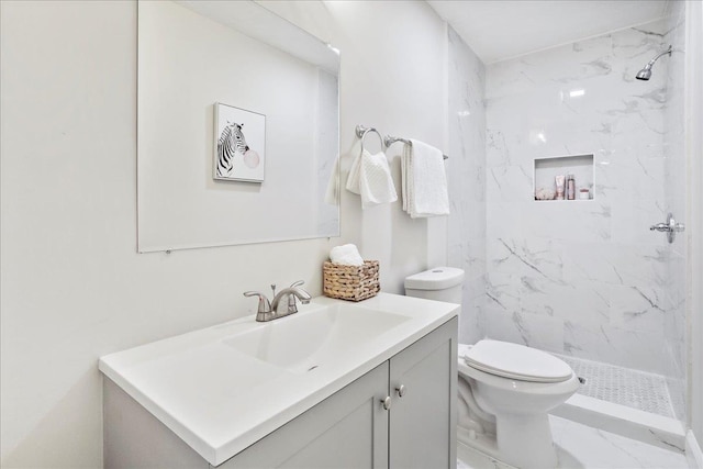 210 Jackson Ave, New Market, VA 22844 - bathroom featuring marble look tile flooring, vanity, a marble finish shower, and toilet