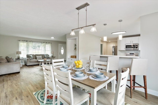 210 Jackson Ave, New Market, VA 22844 - dining space with light wood finished floors