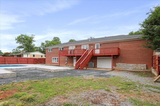 210 Jackson Ave, New Market, VA 22844 - rear view of property with a wooden deck, a patio, a fenced backyard, and central air condition unit
