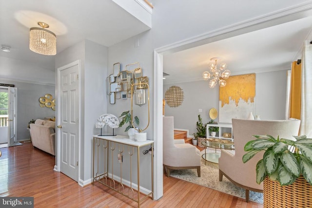 3227 Lancaster Ring Rd, Fredericksburg, VA 22408 - corridor with hardwood / wood-style floors, crown molding, a chandelier, and baseboards