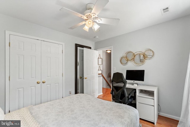 3227 Lancaster Ring Rd, Fredericksburg, VA 22408 - bedroom with light wood finished floors, baseboards, a closet, an office area, and a ceiling fan