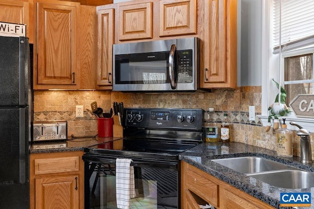 16 Chestnut Ln, Wintergreen Resort, VA 22967 - kitchen featuring black appliances, tasteful backsplash, and a sink