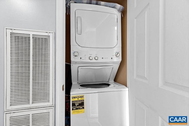 16 Chestnut Ln, Wintergreen Resort, VA 22967 - washroom featuring a heating unit, laundry area, and stacked washing maching and dryer