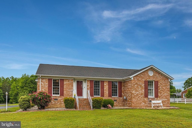 single story home featuring brick siding and roof with shingles