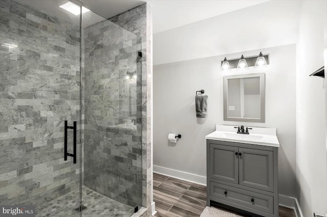 15411 Cedar Hill Dr, Mineral, VA 23117 - bathroom featuring vanity, wood finish floors, and a shower stall