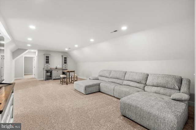 15411 Cedar Hill Dr, Mineral, VA 23117 - living room with wet bar, wine cooler, lofted ceiling, recessed lighting, and light carpet