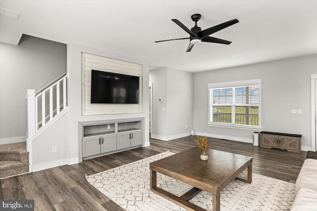 15411 Cedar Hill Dr, Mineral, VA 23117 - living room with wood finished floors, stairway, and a ceiling fan