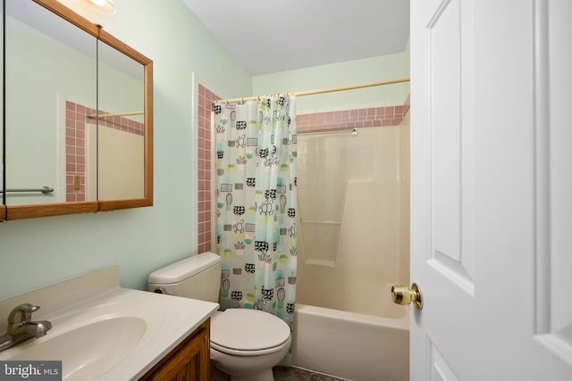 full bathroom with vanity, shower / bath combination with curtain, and toilet