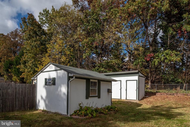 view of shed featuring a fenced backyard