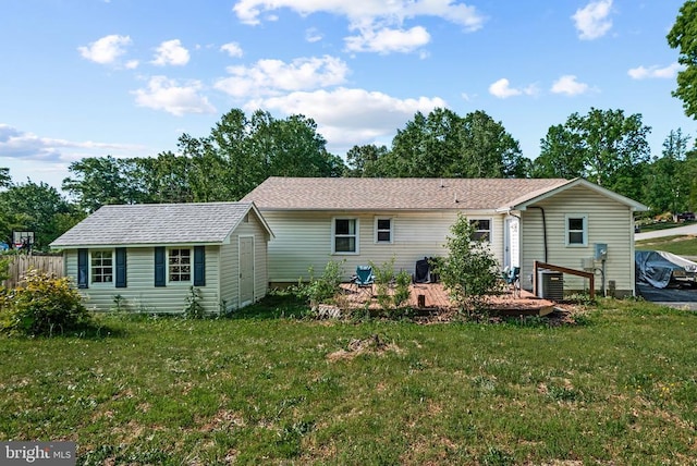 10420 Forest Hill Ct, Fredericksburg, VA 22408 - back of house with a storage shed and a lawn