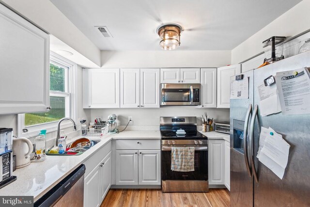 10420 Forest Hill Ct, Fredericksburg, VA 22408 - laundry room featuring independent washer and dryer