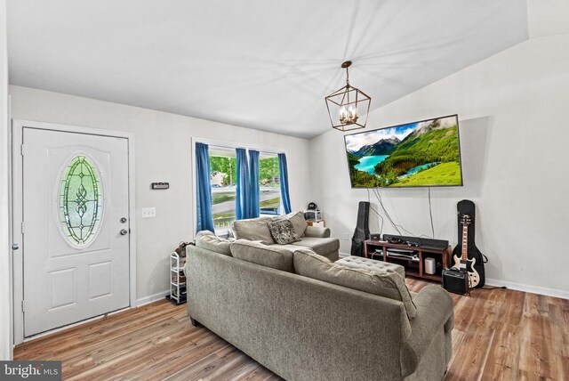 10420 Forest Hill Ct, Fredericksburg, VA 22408 - living area with a chandelier, wood finished floors, and lofted ceiling