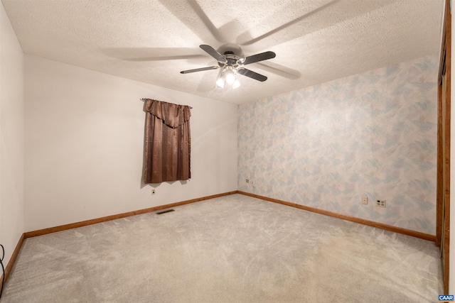 210 Pasture Ln, Stanardsville, VA 22973 - empty room with carpet floors, a ceiling fan, and visible vents