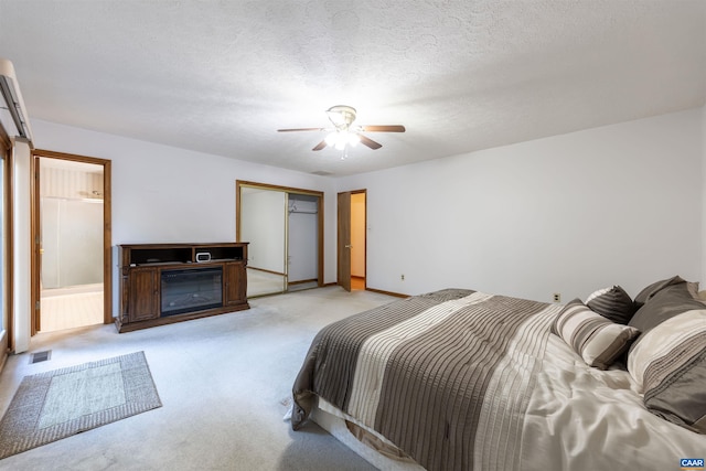 210 Pasture Ln, Stanardsville, VA 22973 - bedroom with a ceiling fan, a closet, baseboards, visible vents, and light colored carpet