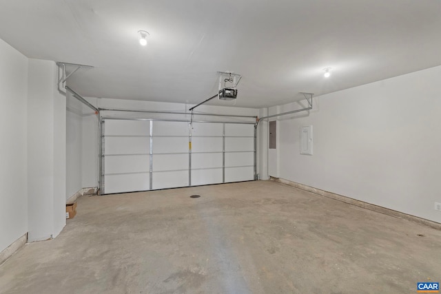 59 Hilah Ln, Charlottesville, VA 22901 - garage featuring baseboards and a garage door opener