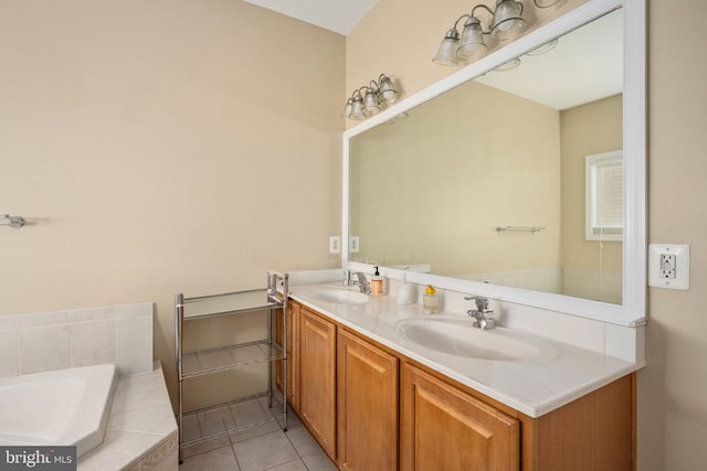 5819 Telluride Ln, Spotsylvania, VA 22553 - full bathroom with double vanity, tile patterned floors, and a garden tub