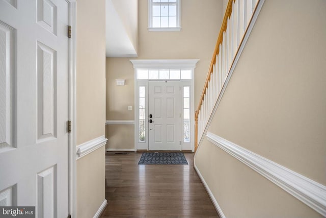 5819 Telluride Ln, Spotsylvania, VA 22553 - foyer entrance with a high ceiling, hardwood / wood-style floors, baseboards, and stairs