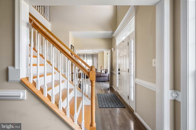 5819 Telluride Ln, Spotsylvania, VA 22553 - entryway featuring wood finished floors, stairway, and baseboards