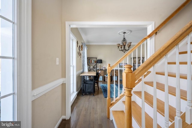 5819 Telluride Ln, Spotsylvania, VA 22553 - entrance foyer featuring wood finished floors, stairs, a chandelier, and crown molding