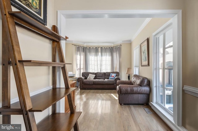 5819 Telluride Ln, Spotsylvania, VA 22553 - living area with crown molding and hardwood / wood-style floors