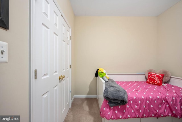 5819 Telluride Ln, Spotsylvania, VA 22553 - carpeted bedroom featuring a closet and baseboards
