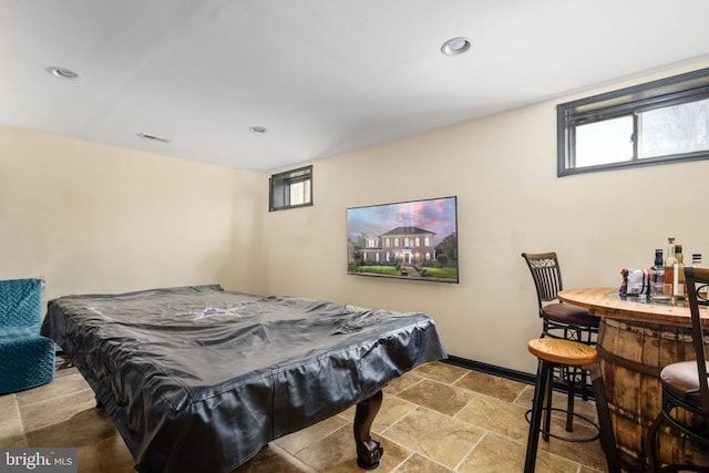 5819 Telluride Ln, Spotsylvania, VA 22553 - recreation room featuring stone finish flooring, baseboards, and recessed lighting