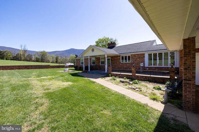 407 Kite Hollow Rd, Stanley, VA 22851 - view of grassy yard with a mountain view and a patio