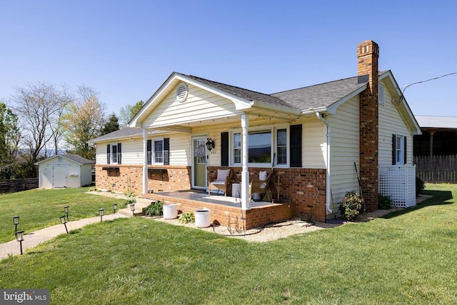 407 Kite Hollow Rd, Stanley, VA 22851 - single story home featuring a porch, central air condition unit, brick siding, a chimney, and a storage shed