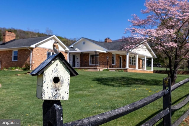 407 Kite Hollow Rd, Stanley, VA 22851 - view of front of house featuring brick siding, a porch, and a chimney